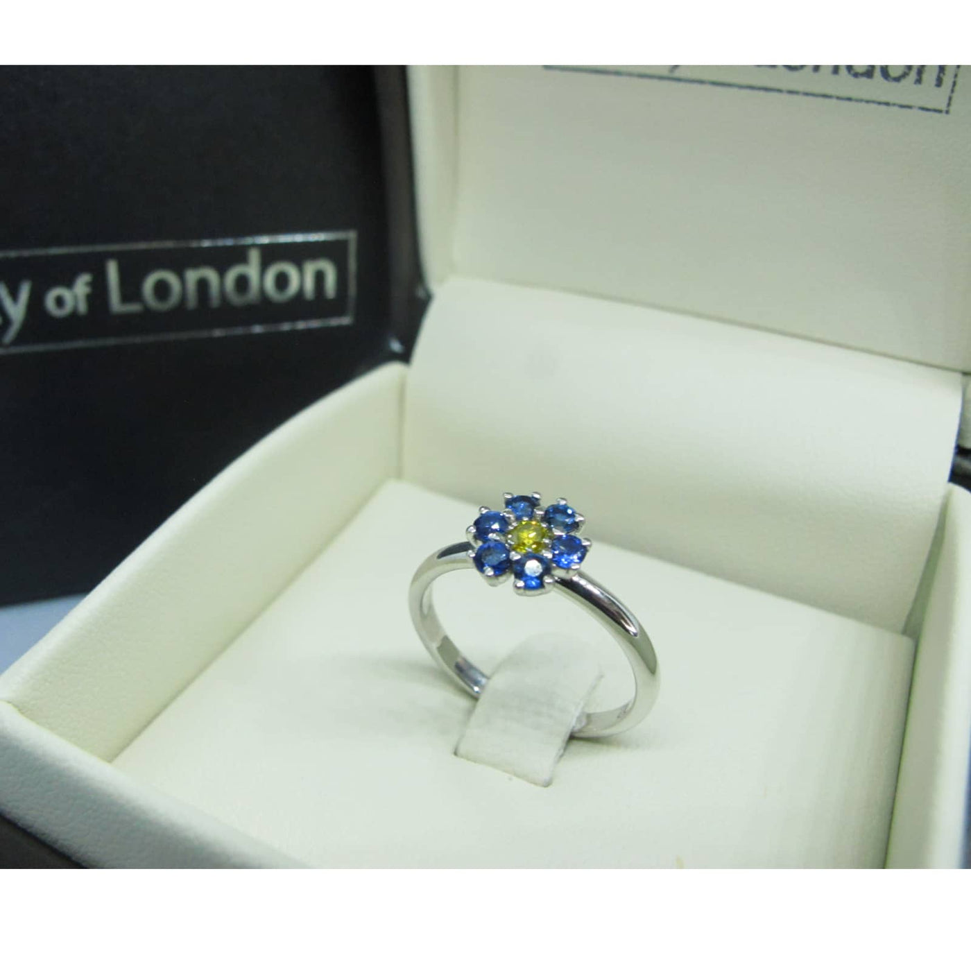 Solitaire Ring with Sapphires and Fancy Yellow Diamond